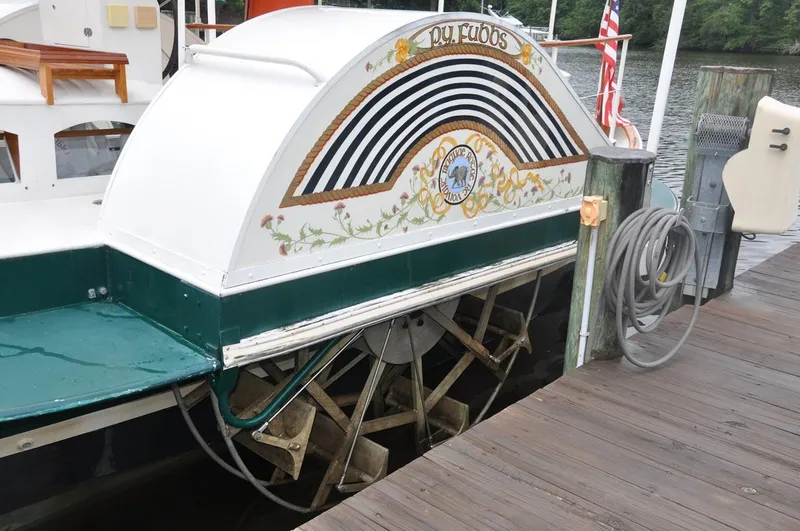 Slide: The Image of Sidewheel paddle yacht docked, showcasing intricate design and vintage charm, Custom model, 1987. - 13