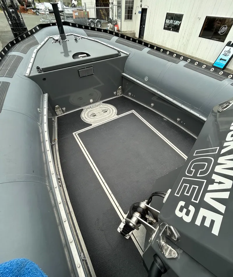 Slide: The Image of 2015 Titan 33 boat interior with Shockwave ICE 3 seating, gray design. - 10