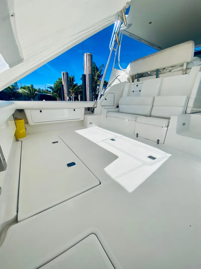 Slide: The Image of 1999 Tiara Yachts 43 Open with spacious deck and seating area. - 35
