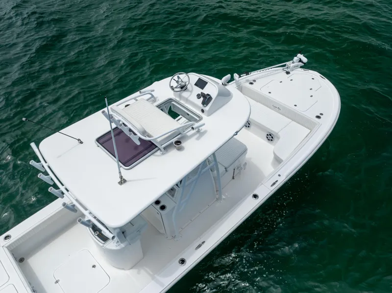 Slide: The Image of Aerial view of 2023 Canyon Bay 28h boat on water. - 18