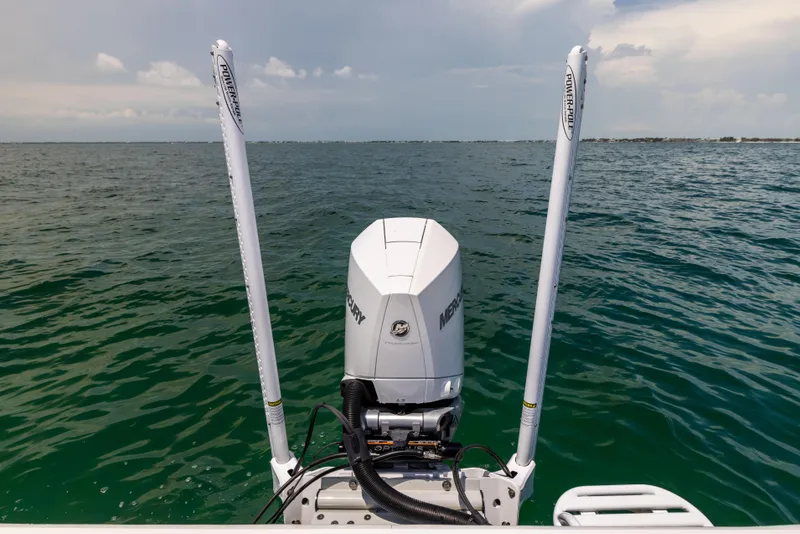 Slide: The Image of Canyon Bay 28h boat with Mercury engine on open water, 2023 model. - 21