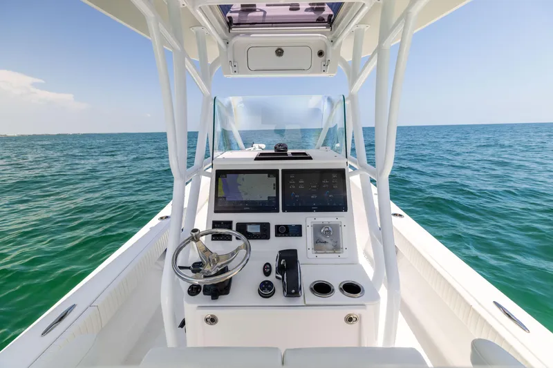 Slide: The Image of 2023 Canyon Bay 28h boat console with ocean view. - 40