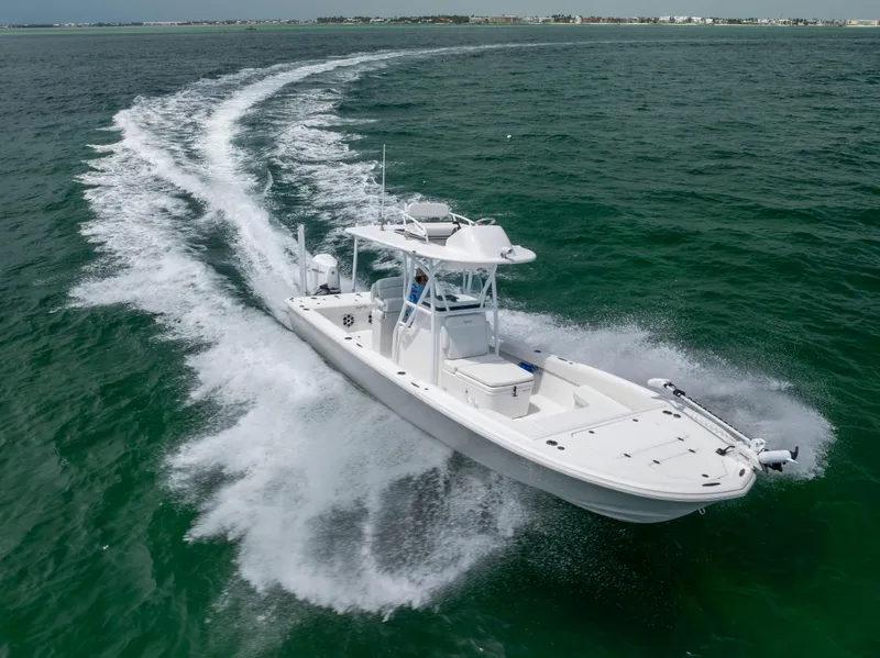 Slide: The Image of Canyon Bay 28h boat cruising on open water, 2023 model. - 8