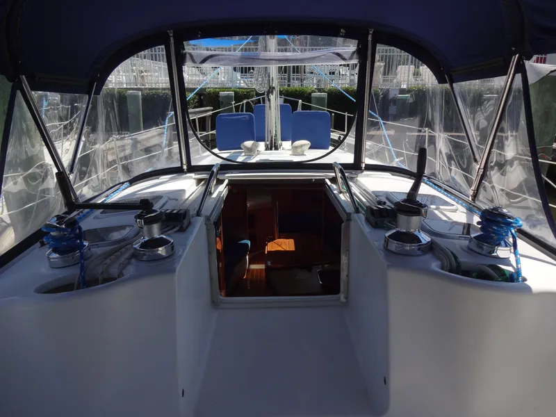 Slide: The Image of Interior view of 2001 Hunter 380 sailboat cockpit with winches and seating. - 10