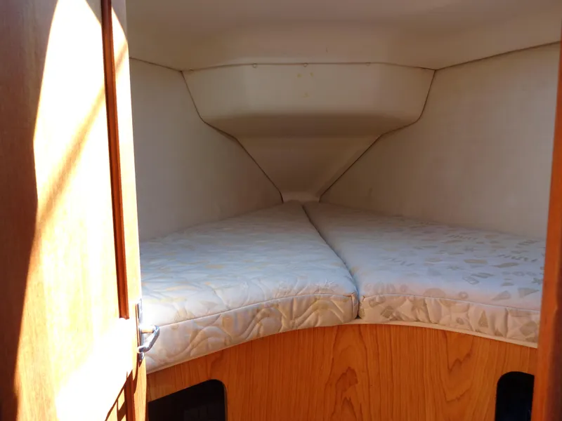 Slide: The Image of Interior cabin of 2001 Hunter 380 sailboat with V-berth bed. - 35
