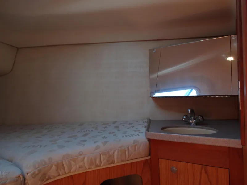 Slide: The Image of Cozy cabin interior of 2001 Hunter 380 sailboat with bed and sink. - 36