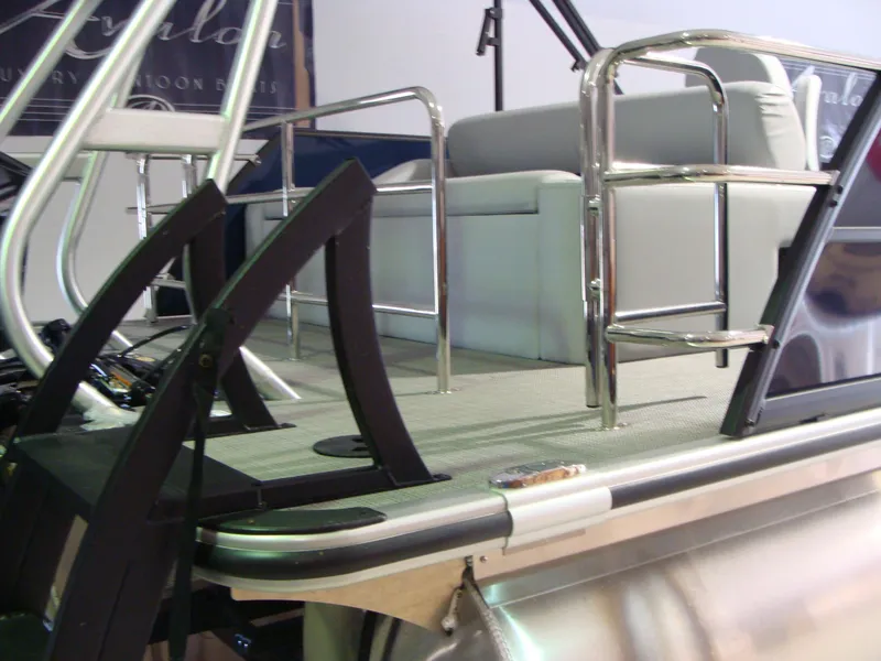 Slide: The Image of 2024 Bentley Pontoons 243 Swingback with sleek seating and modern railings. - 11