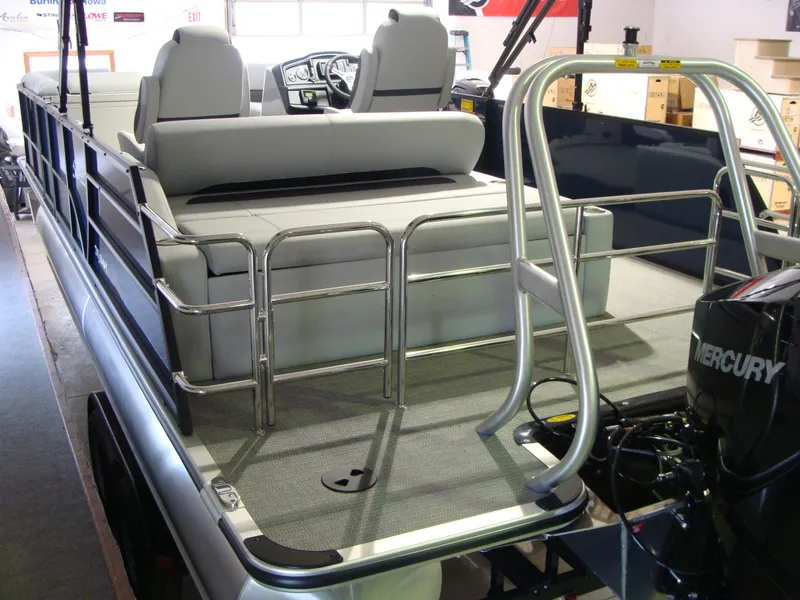 Slide: The Image of 2024 Bentley Pontoons 243 Swingback with Mercury engine, featuring spacious seating and sleek design. - 14