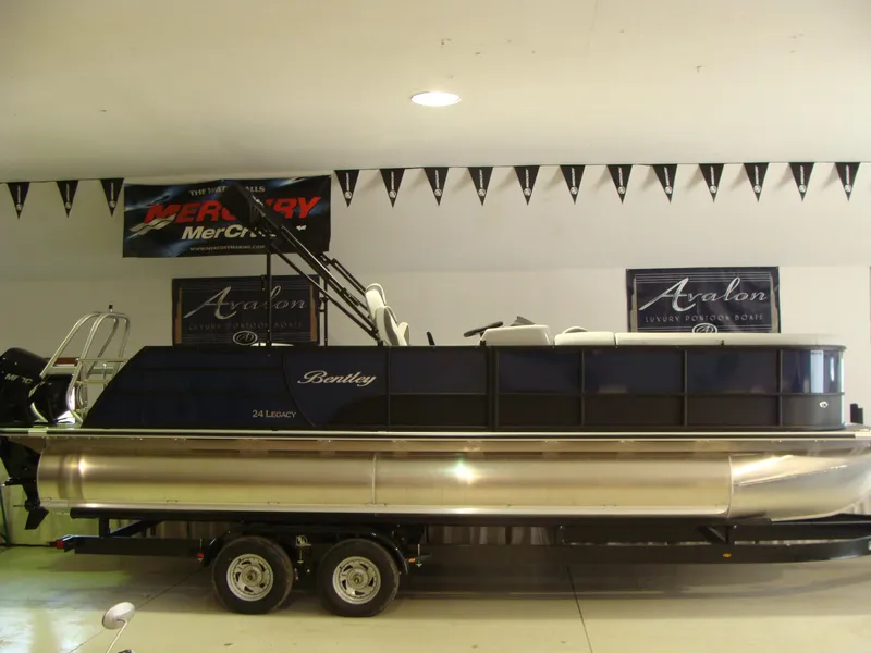 Slide: The Image of 2024 Bentley Pontoons 243 Swingback on display in showroom. - 9