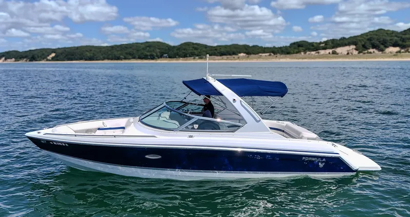 The Image of 2005 Formula 280 Bowrider on calm water with cloudy sky. - 0