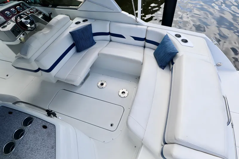 Slide: The Image of Interior of a 2005 Formula 280 Bowrider with white seating. - 13