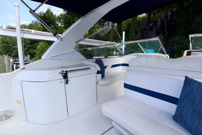 Slide: The Image of Interior of a 2005 Formula 280 Bowrider boat with blue accents. - 15
