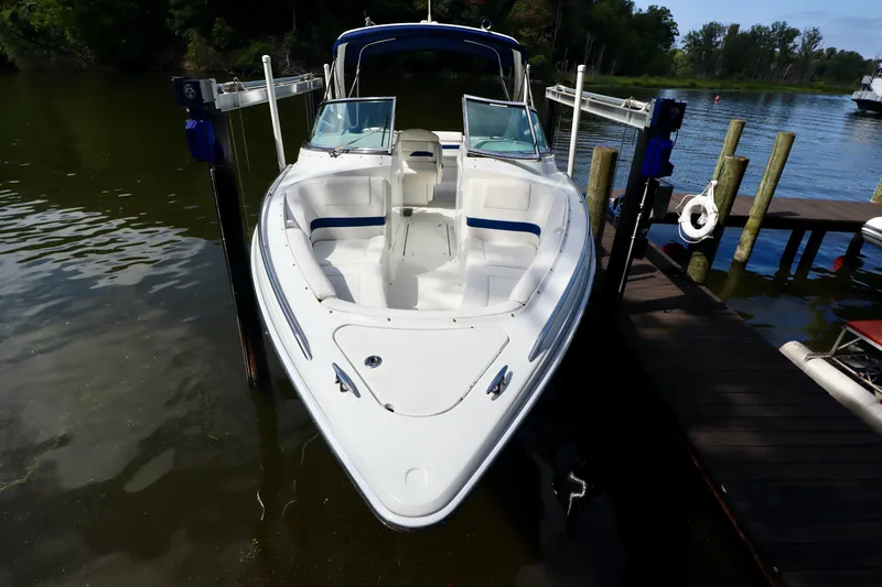 Slide: The Image of 2005 Formula 280 Bowrider boat at dock, calm water. - 20