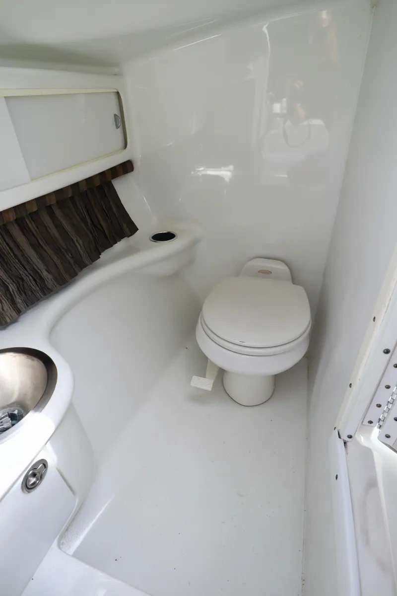 Slide: The Image of Interior of 2005 Formula 280 Bowrider featuring toilet and sink. - 21