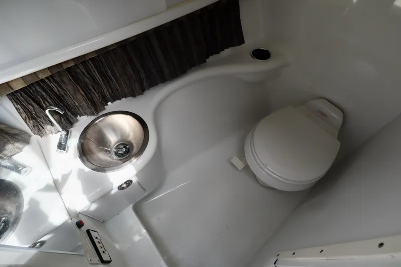Slide: The Image of Interior of 2005 Formula 280 Bowrider with toilet and sink. - 22