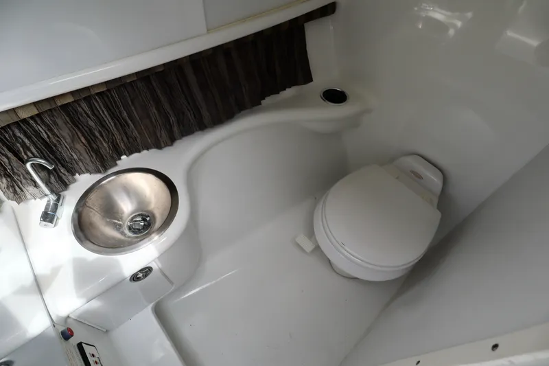 Slide: The Image of Interior of 2005 Formula 280 Bowrider with toilet and sink. - 23