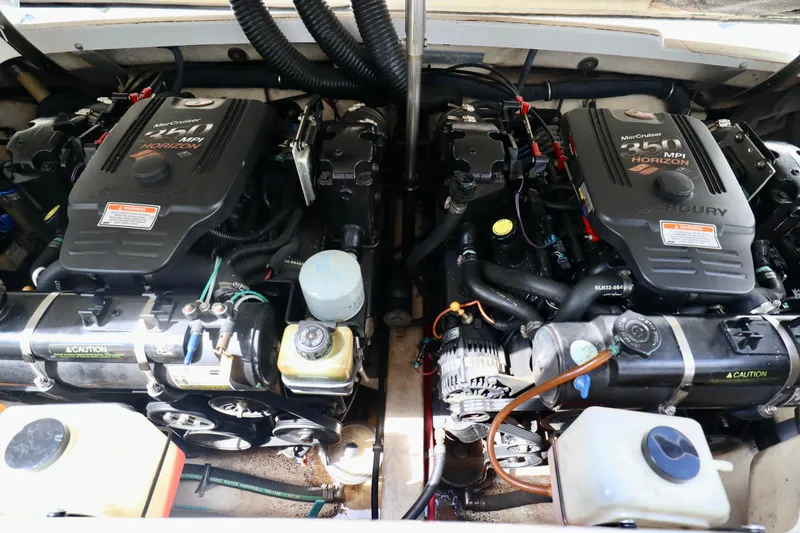 Slide: The Image of Dual engines of a 2005 Formula 280 Bowrider boat. - 25