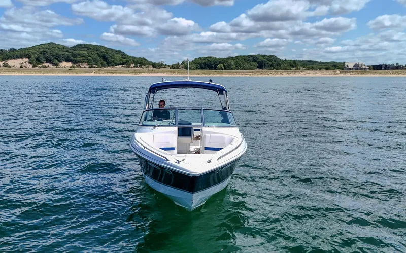 Slide: The Image of 2005 Formula 280 Bowrider on calm water near wooded shoreline. - 3