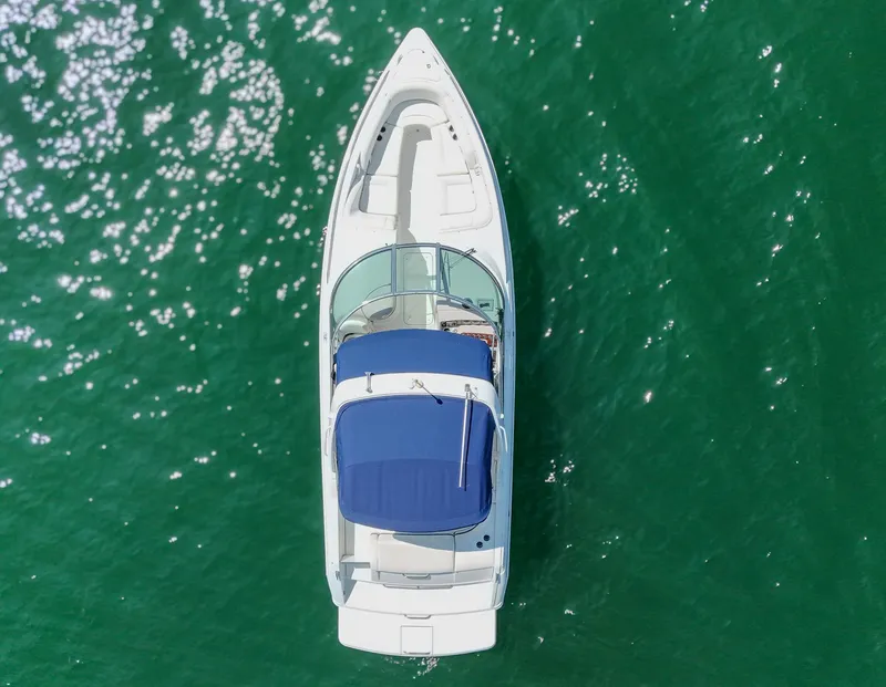 Slide: The Image of Aerial view of 2005 Formula 280 Bowrider on green water. - 4