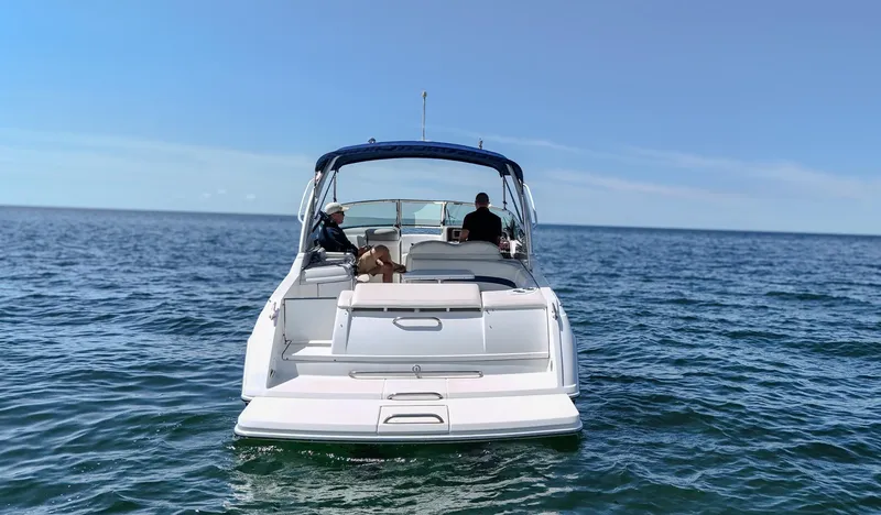 Slide: The Image of 2005 Formula 280 Bowrider on open sea, two people onboard. - 5