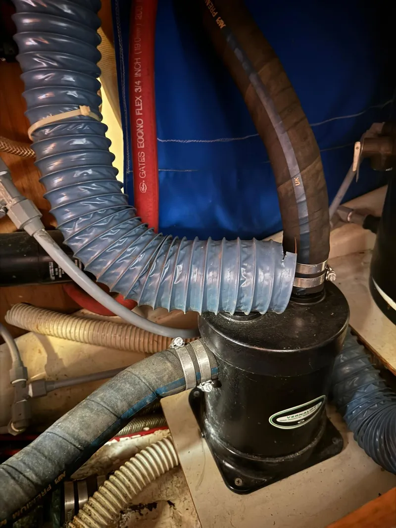 Slide: The Image of Close-up of 1987 Ericson 35-3 boat engine hoses and components. - 34