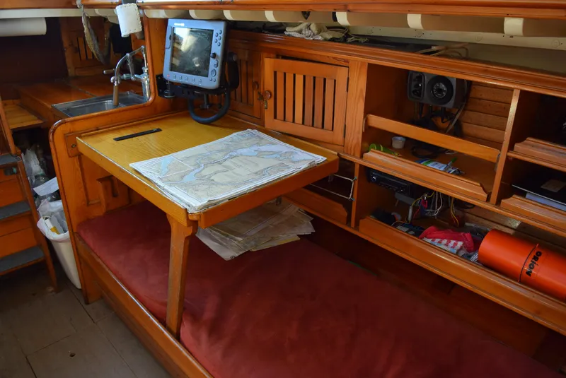 Slide: The Image of Interior of 1964 Concordia 41 Yawl with navigation table and equipment. - 6