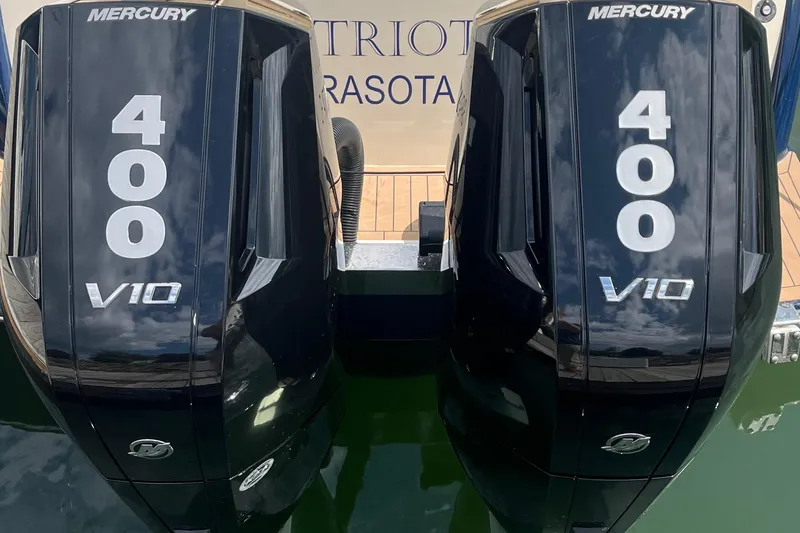 Slide: The Image of 2024 Scout 330 LXF with twin Mercury 400 V10 outboard engines. - 12