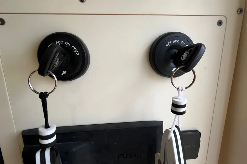 Slide: The Image of 2024 Scout 330 LXF ignition keys in dual ignition switches. - 47