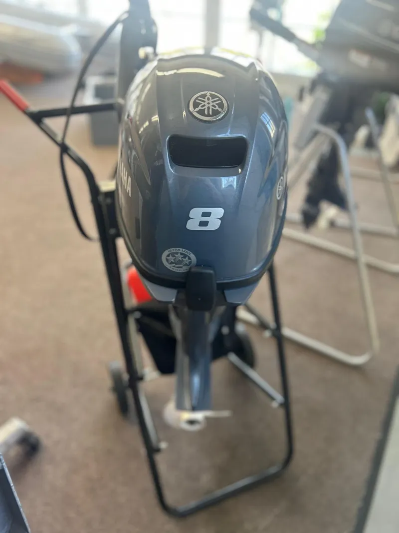 Slide: The Image of 2021 Yamaha F8 outboard motor on display stand, North Atlantic Inflatables model ALA300. - 4