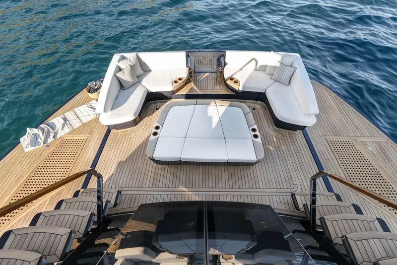 Slide: The Image of Luxurious 2023 Lazzara LSX 67 yacht deck with elegant seating and ocean view. - 5