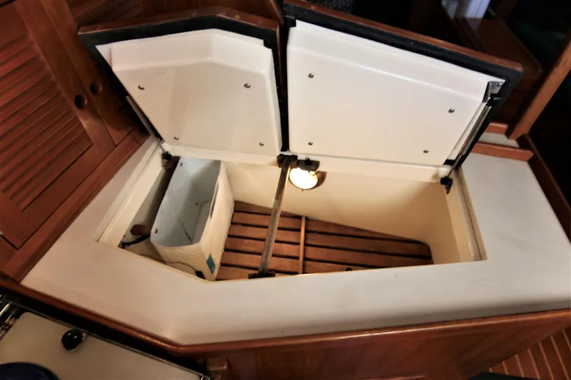 Slide: The Image of Open storage compartment in 1998 Tartan 4100 sailboat interior. - 44