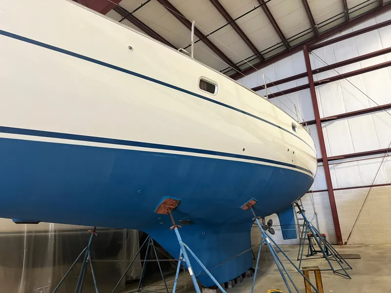 Slide: The Image of Oyster 46.5 sailboat from 1987 in a storage facility. - 38