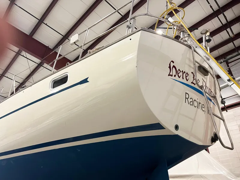 Slide: The Image of Oyster 46.5 sailboat from 1987 in a storage facility, Racine, WI. - 40