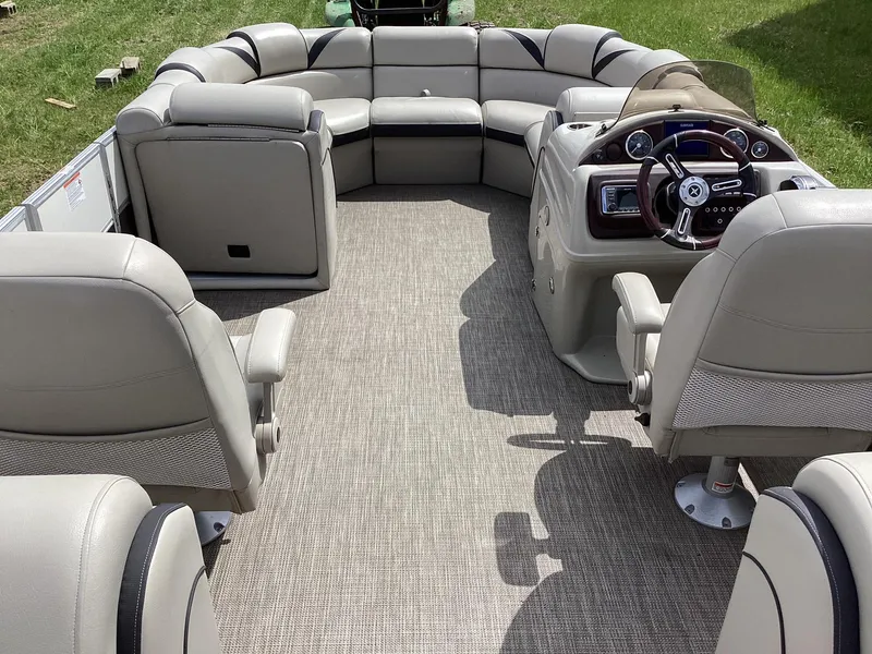 Slide: The Image of 2018 Berkshire 23RFX STS 2.0 pontoon boat interior with plush seating and modern helm. - 10
