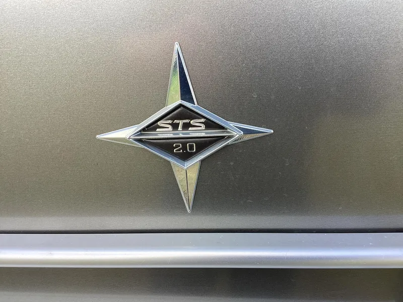 Slide: The Image of 2018 Berkshire 23RFX STS 2.0 emblem on metallic surface. - 14