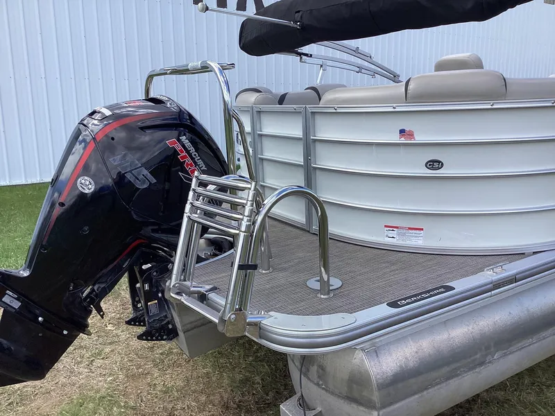 Slide: The Image of 2018 Berkshire 23RFX STS 2.0 pontoon boat with outboard motor and ladder. - 7