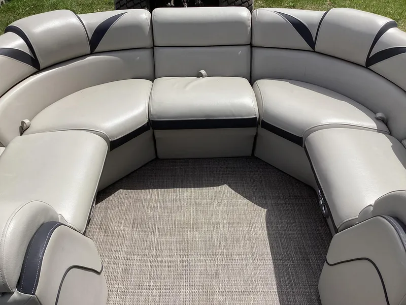 Slide: The Image of Luxurious seating on 2018 Berkshire 23RFX STS 2.0 pontoon boat, featuring plush, curved design. - 9