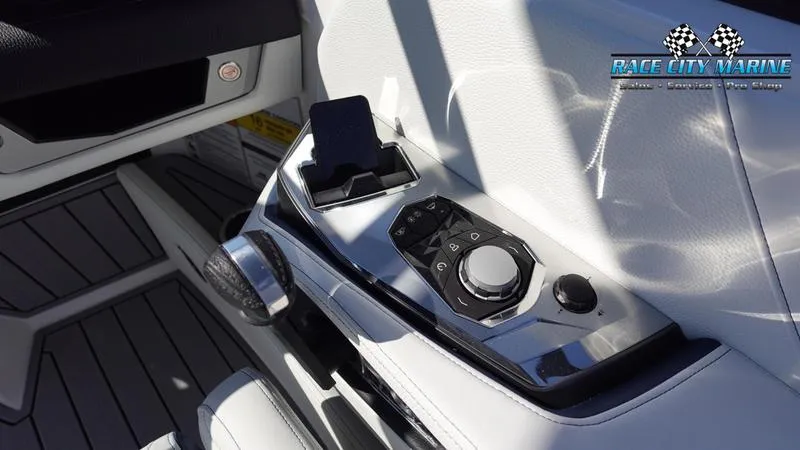 Slide: The Image of 2025 Nautique Super Air Nautique G23 control panel with sleek design and advanced features. - 15