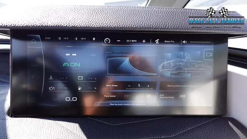 Slide: The Image of 2025 Nautique Super Air Nautique G23 dashboard display with advanced controls and navigation. - 22