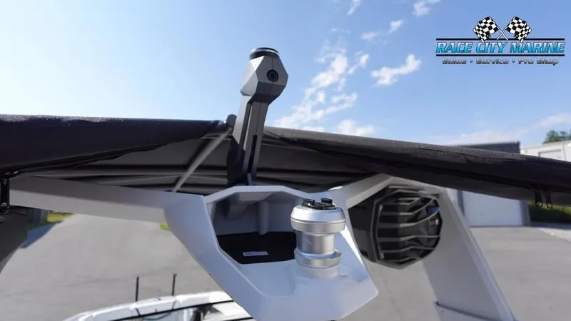 Slide: The Image of 2025 Nautique Super Air Nautique G23 boat tower with speaker and Race City Marine logo. - 24
