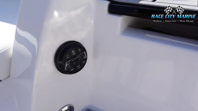 Slide: The Image of 2025 Nautique Super Air Nautique G23 boat control panel close-up. - 31