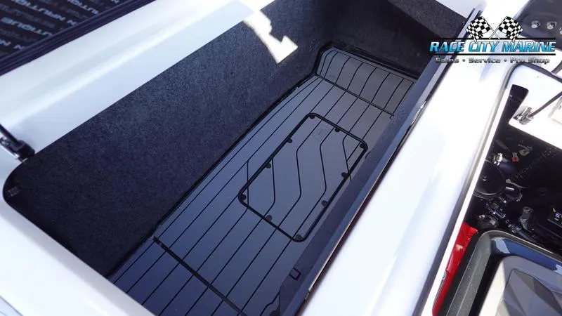 Slide: The Image of 2025 Nautique Super Air Nautique G23 storage compartment, spacious and sleek design. - 39