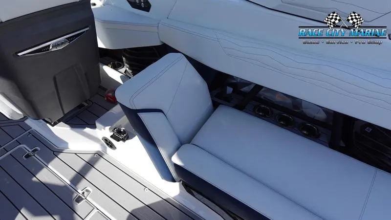 Slide: The Image of 2025 Nautique Super Air Nautique G23 interior seating and deck detail. - 43