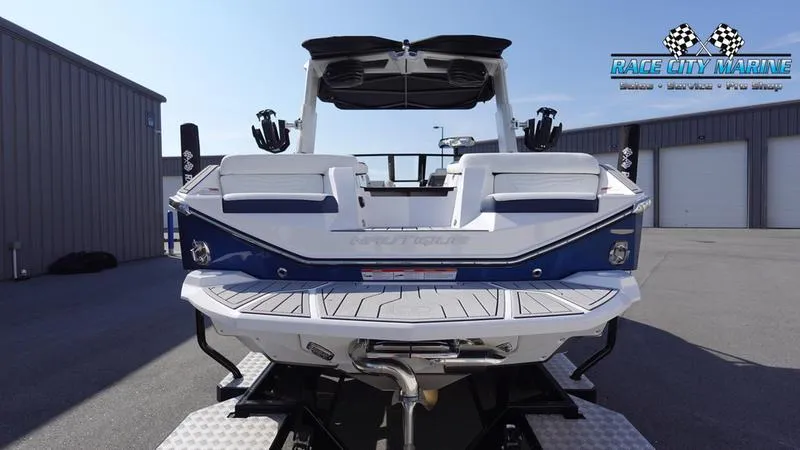Slide: The Image of 2025 Nautique Super Air Nautique G23 boat at Race City Marine dealership. - 7