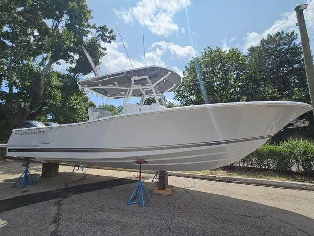 The Image of 2026 Southport 30FE boat in a warehouse, showcasing sleek design and modern features. - 0