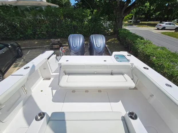 Slide: The Image of 2026 Southport 30FE boat with dual Mercury outboard engines in a workshop setting. - 8