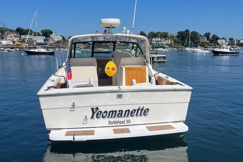Slide: The Image of 1990 Tiara Yachts 3100 boat named Yeomanette in Marblehead harbor. - 4