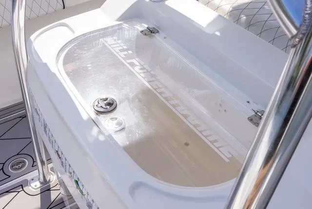 Slide: The Image of 2007 Spectre 37 Center Console livewell with clear lid and stainless steel fittings. - 30