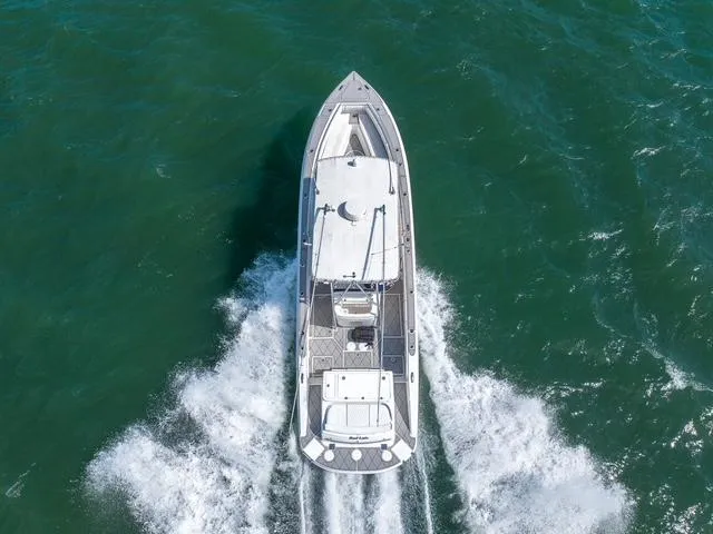 Slide: The Image of Aerial view of 2007 Spectre 37 Center Console boat cruising on the ocean. - 6