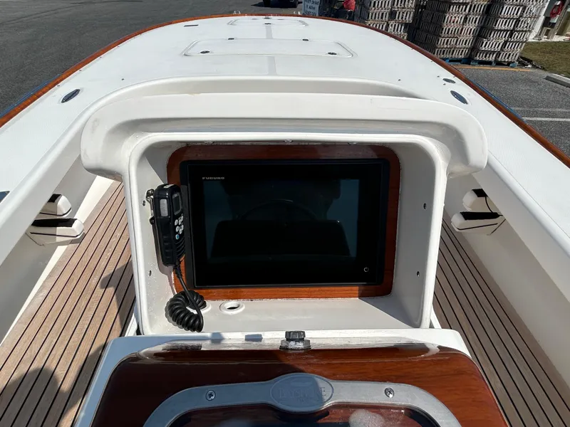 Slide: The Image of Bayshore Carolina Flats 20 boat console with navigation screen, 2002 model. - 14